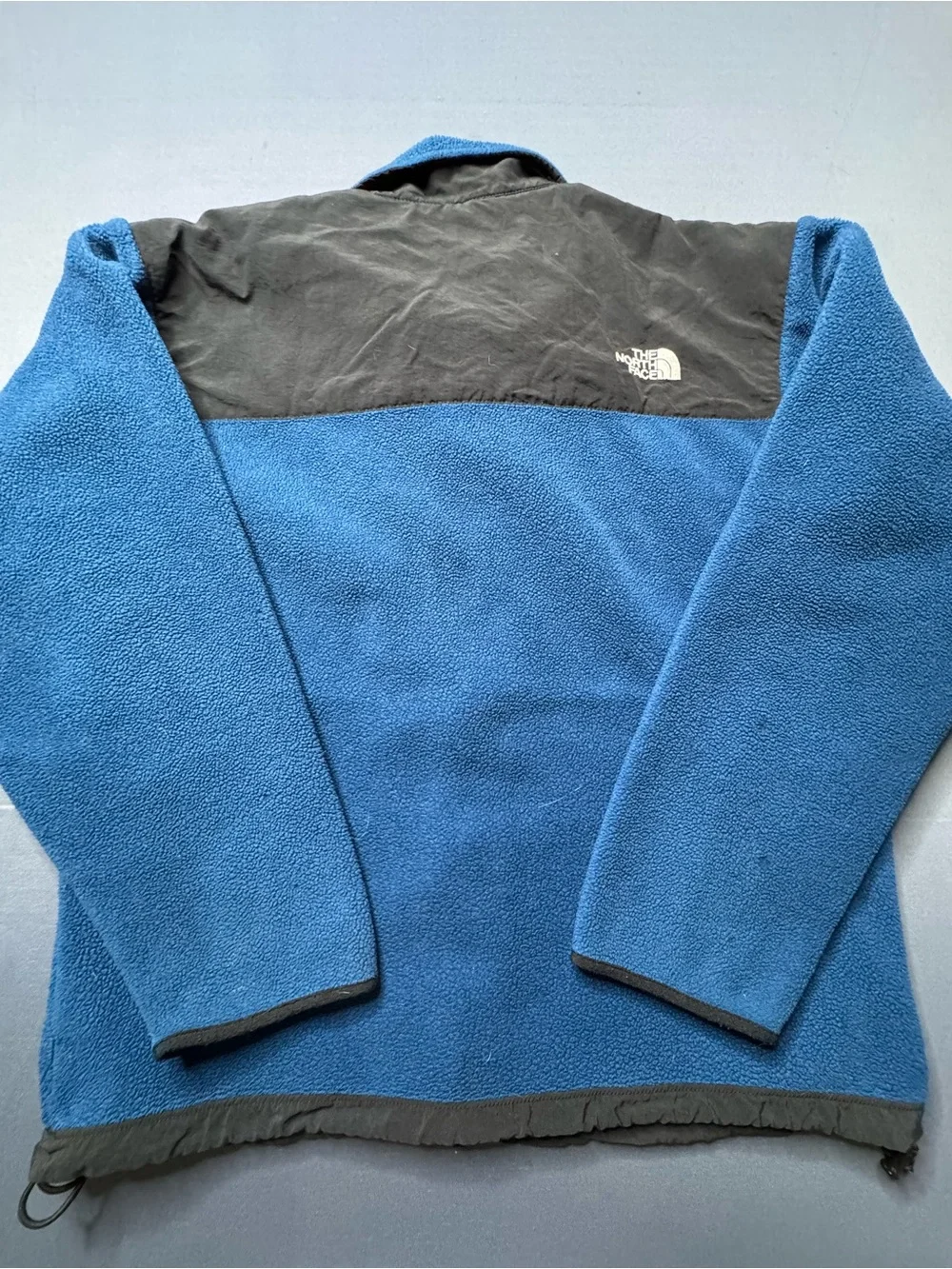 The North Face blue and black polyester fleece jacket in size M 1260